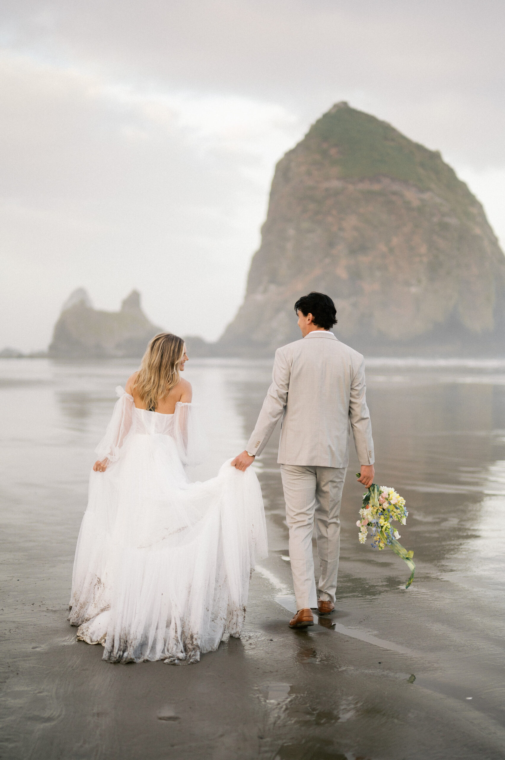 Cannon beach Oregon elopement couple