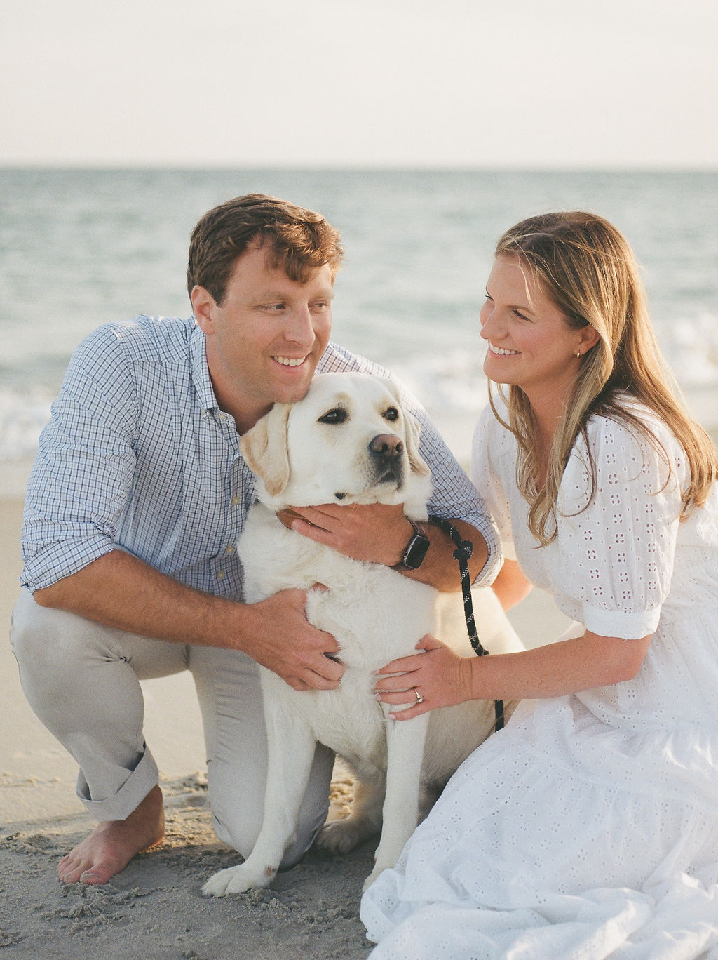 Beach engagement photos with dog