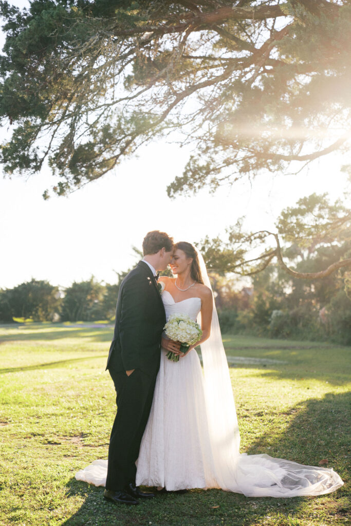 golden hour bride and groom wedding photos at the berkley manor, an ocracoke wedding venue