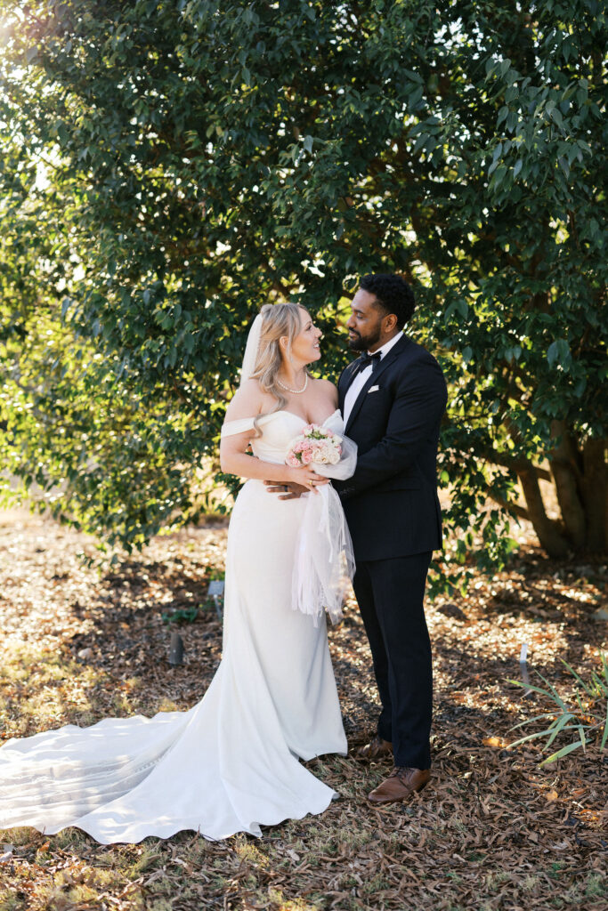 bride and groom at the JC Raulston Arboretum