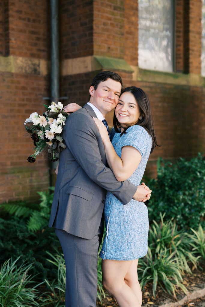 couple walking the streets during their North Carolina courthouse elopement