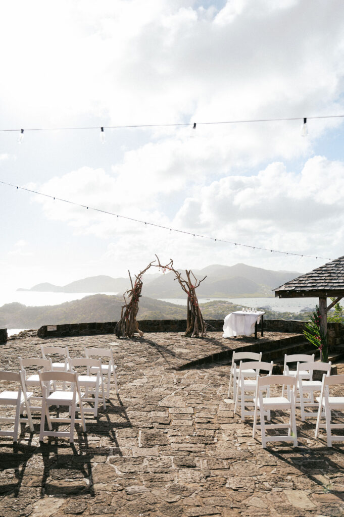 caribbean destination wedding ceremony set up overlooking the marina