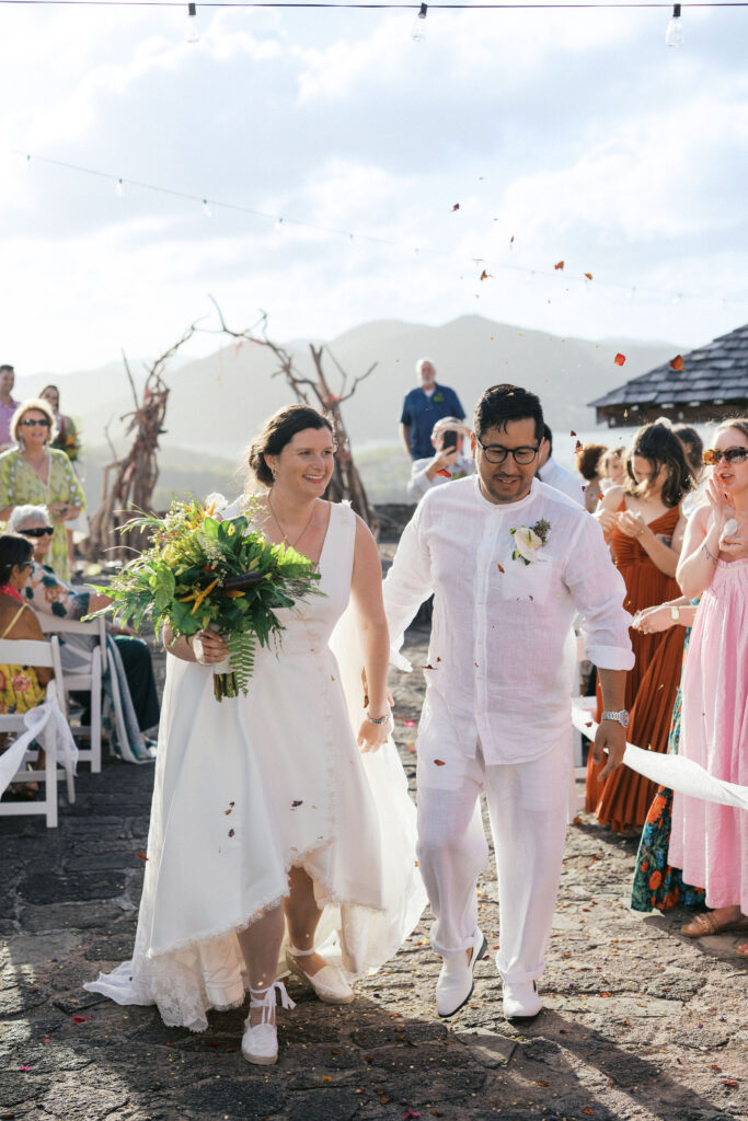 caribbean destination wedding ceremony at a venue overlooking the marina