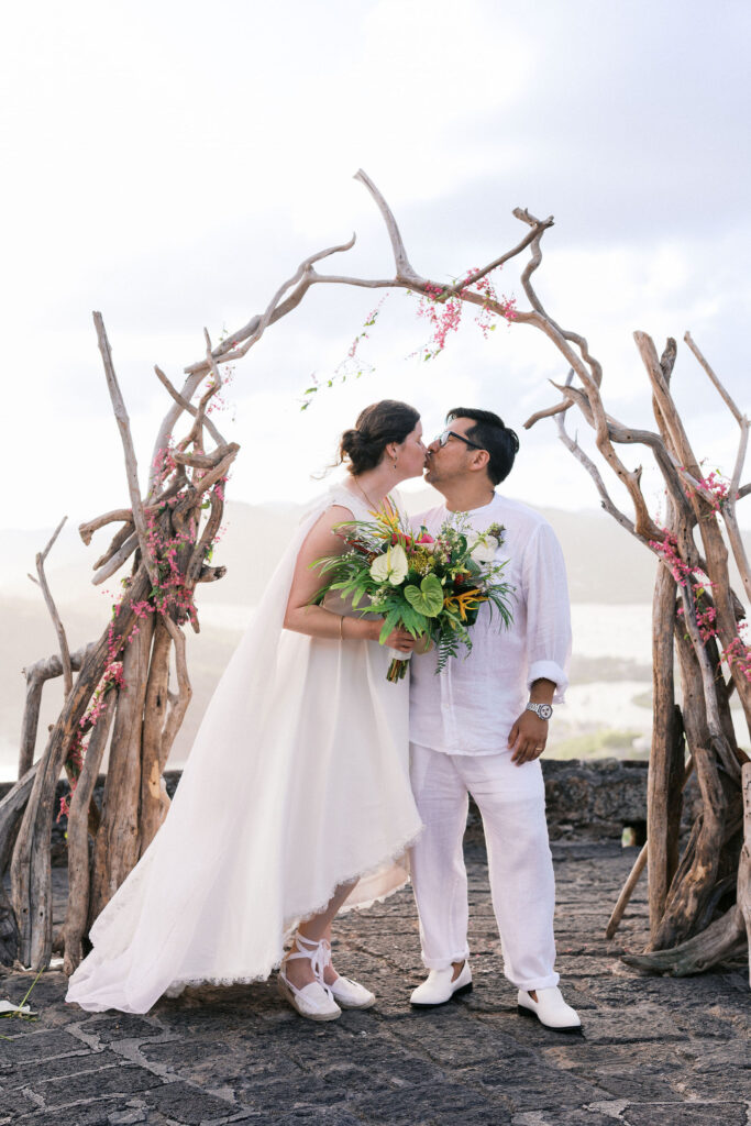 caribbean destination wedding ceremony at a venue overlooking the marina