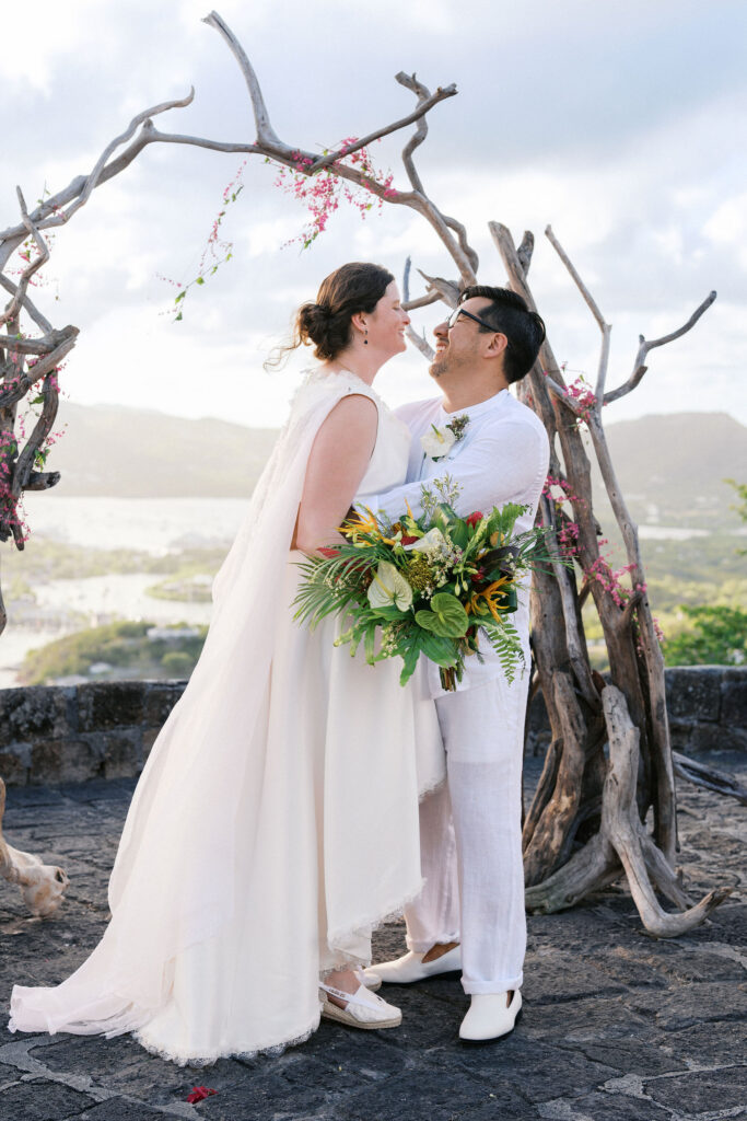 caribbean destination wedding ceremony at a venue overlooking the marina